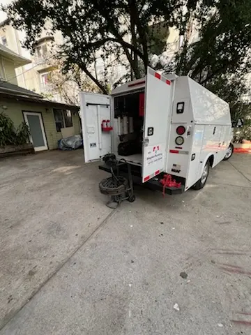 Magnet Plumbing service vehicle on-site for Water Heater Repair in Jupiter Ocean-Racquet Club